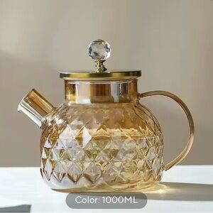 Elegant Glass Teapot with Gold Accents